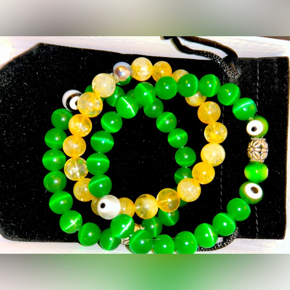 Green evil eye and citrine glass tigers eye hand made by me